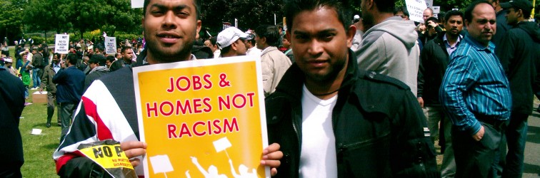 pose with placard
